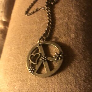 Misplaced 
🌎❤️Hippie Peace Brass Necklace - 732 $12 or 🎉